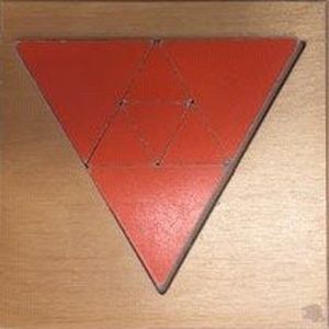 Puzzel driehoek oranje 7 stukjes