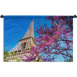 Wandkleed Eiffeltoren - De Eiffeltoren met een uniek roze boom die de afbeelding een kleurrijk effect geeft Wandkleed katoen 180x120 cm - Wandtapijt met foto XXL / Groot formaat!