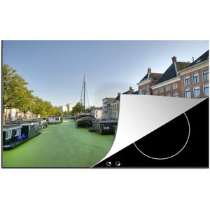 KitchenYeah® Inductie beschermer 78x52 cm - Groningen - Grachtenpand - Water - Kookplaataccessoires - Afdekplaat voor kookplaat - Inductiebeschermer - Inductiemat - Inductieplaat mat