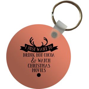 Sleutelhanger - Kerst quote I just want to drink hot cocoa met een oranjebruine achtergrond - Plastic - Rond - Uitdeelcadeautjes - Kerst - Cadeau - Kerstcadeau voor mannen en voor vrouwen