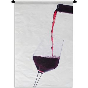 Wandkleed Rode wijn - Fles wijn wat rode wijn in het glas schenkt Wandkleed katoen 120x180 cm - Wandtapijt met foto XXL / Groot formaat!