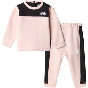 The north face tweedelige tnf tech-set in de kleur roze.