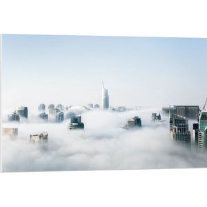 PVC Schuimplaat- Wolkenkrabbers boven de Wolken in Stad - 90x60 cm Foto op PVC Schuimplaat