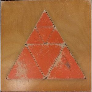 Puzzel driehoek oranje 7 stukjes (zie omschrijving)