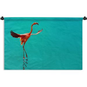 Wandkleed Flamingo  - Flamingo in de blauwe zee Wandkleed katoen 90x60 cm - Wandtapijt met foto