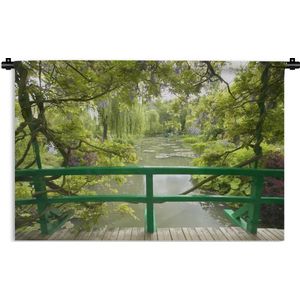 Wandkleed Monet's tuin - Uitzicht op het water vanaf de Japanse brug in Monet's tuin in het Franse Giverny Wandkleed katoen 60x40 cm - Wandtapijt met foto