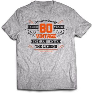 80 Jaar Legend - Feest kado T-Shirt Heren / Dames - Antraciet Grijs / Oranje - Perfect Verjaardag Cadeau Shirt - grappige Spreuken, Zinnen en Teksten. Maat 3XL
