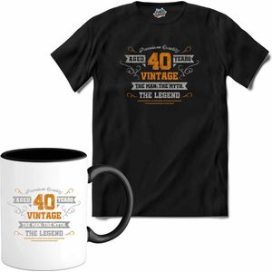 40 Jaar vintage legend - Verjaardag cadeau - Kado tip - T-Shirt met mok - Dames - Zwart - Maat S