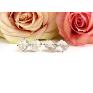 Oorringen in wit goud gezet met roze kwarts en diamant