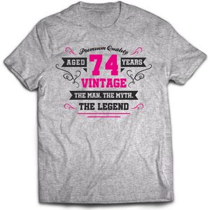 74 Jaar Legend - Feest kado T-Shirt Heren / Dames - Antraciet Grijs / Roze - Perfect Verjaardag Cadeau Shirt - grappige Spreuken, Zinnen en Teksten. Maat M