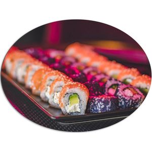 Dibond Ovaal - Schaal Vol met Verschillende Smaken Sushi in Paars Licht - 108x81 cm Foto op Ovaal (Met Ophangsysteem)