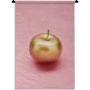 Wandkleed Stillevens Abstract - Stilleven van een gouden appel op een roze achtergrond Wandkleed katoen 60x90 cm - Wandtapijt met foto