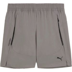Puma pumatech relaxed shorts 6 in de kleur grijs.