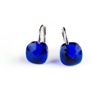 Zilveren oorringen oorbellen model pomellato kobalt blauwe steen