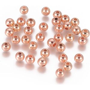 Metalen spacer kralen, rond 4mm, rose goudplated, rijggat 1mm. Per 200 stuks