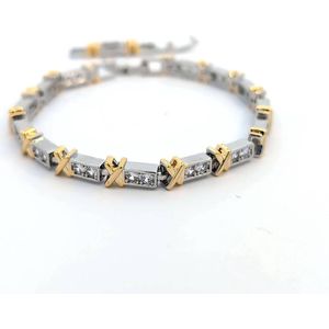 Zilveren armband met goud kleurige kruisjes en afgezet met strass dames zilverkleurig