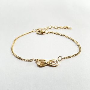 GoedeDoelen.Shop | Enkelbandje Double Infinity | Anklet | Infinity enkelbandje | Infinity Sieraad | Goudkleurig | Enkelmaat ca 20 + 5 CM | Zomer | Ibizastyle | Unisex | Wellness-House