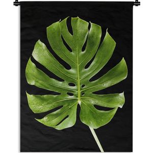 Wandkleed Bladeren op een zwarte achtergrond - Groen palmblad op zwarte achtergrond Wandkleed katoen 120x160 cm - Wandtapijt met foto XXL / Groot formaat!