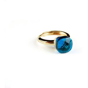 Ring in zilver geelgoud verguld model pomellato turkoois blauwe steen