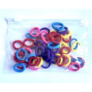 Haarelastiekjes mini endless. 50 stuks assortie bright kleurtjes. 2cm breed. Kleine haarelastiekjes voor Jong en oud.