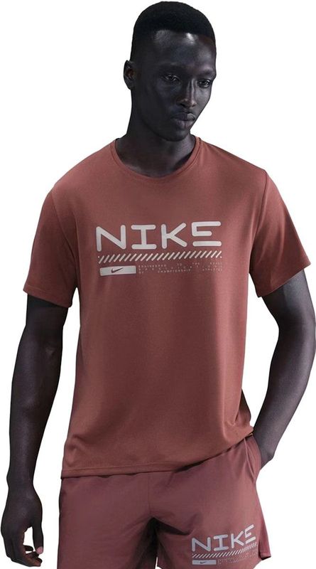 Nike miler winterized sh in de kleur bruin.