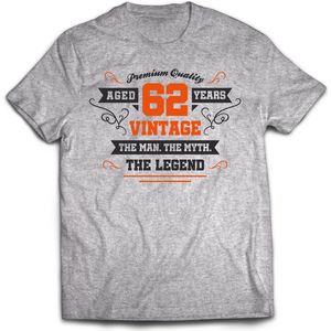 62 Jaar Legend - Feest kado T-Shirt Heren / Dames - Antraciet Grijs / Oranje - Perfect Verjaardag Cadeau Shirt - grappige Spreuken, Zinnen en Teksten. Maat L