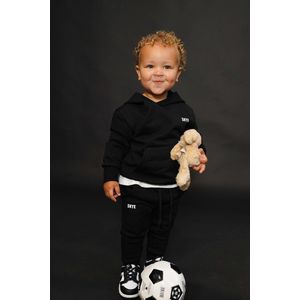 SKYE Clothing Unisex Kinder Trainingspak Zwart