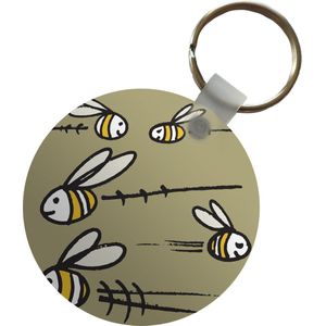 Sleutelhanger - Een illustratie van vijf bijen tegen een beige achtergrond - Plastic - Rond - Uitdeelcadeautjes
