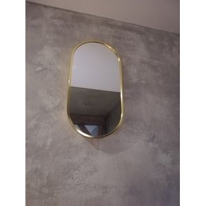 spiegel ovaal met goudkleurige rand luxe uitstraling