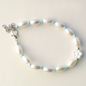 Parelarmband met bloem - wit/blauw