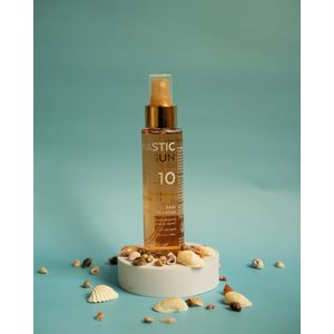Tanning bronzer oil spf 10
