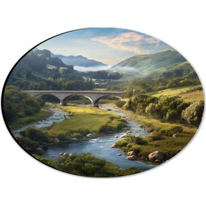 Dibond Ovaal - Rivier - Bergen - brug - Water - Stenen - Gras - Bomen - Wolken - 28x21 cm Foto op Ovaal (Met Ophangsysteem)