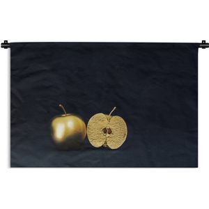Wandkleed Goud Geverfd - Stilleven van een gouden appel op een zwarte achtergrond Wandkleed katoen 60x40 cm - Wandtapijt met foto