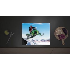 Inductieplaat Beschermer - Stuntman op Vliegende Sneeuwmobiel in Sneeuwlandschap - 60x52 cm - 2 mm Dik - Inductie Beschermer met zwarte kern