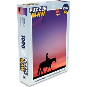 Puzzel Silhouet van een cowboy bij een paarse lucht - Legpuzzel - Puzzel 1000 stukjes volwassenen