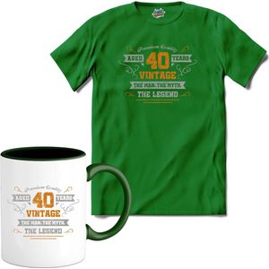 40 Jaar vintage legend - Verjaardag cadeau - Kado tip - T-Shirt met mok - Dames - Kelly Groen - Maat XL