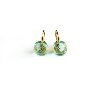 Zilveren oorringen oorbellen geelgoud verguld model pomellato met licht blauwe steen
