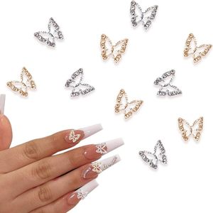 10 stuks legering vlinder-nagelbedels met strass-steentjes voor nail-art - goud en zilver - nageldecoratie met vlinders!