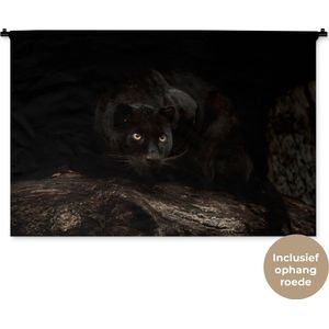 Wandkleed Dieren - Zwarte panter in een donker bos Wandkleed katoen 150x100 cm - Wandtapijt met foto