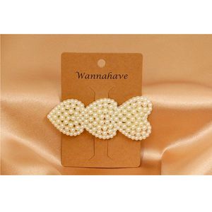 Haarklem met hartjes - Imitatieparels