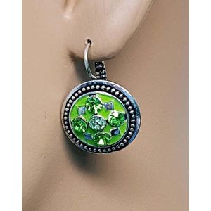 Ronde groene oorbellen met strass stenen