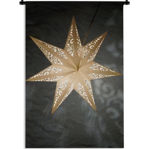 Wandkleed Kerst - Een verlichtte ster tijdens de winter Wandkleed katoen 120x180 cm - Wandtapijt met foto XXL / Groot formaat!