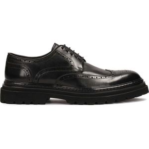 Black shoes with brogue decoration