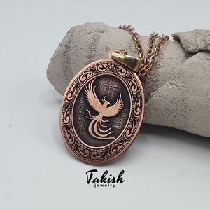 Takish Mythische Vogel Ketting - 100% Zuiver Koper, 50cm Ketting, 5g, 3.2cm Feniks Hanger, 1mm Dik, Koperkleur, Handgemaakt, Symboliek van Transformatie en Hoop, Uniek Ontwerp met Opgelichte Vleugels