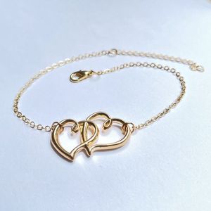 Wellness-House | Enkelbandje Double Hearts Gold | Anklet |  Liefde | Love | Goudkleurig Enkelbandje | Enkelsieraad | Unisex |  Love Is Love | Zomer | Beachlife | Afmeting ca 23 + 5 CM | Armband | Zen Sieraad