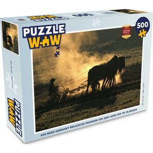 Puzzel Een boer gebruikt Belgische paarden om zijn land om te ploegen - Legpuzzel - Puzzel 500 stukjes