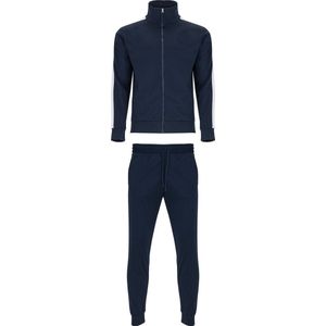 Donkerblauw trainingspak met witte streep model Creta merk Roly maat XL