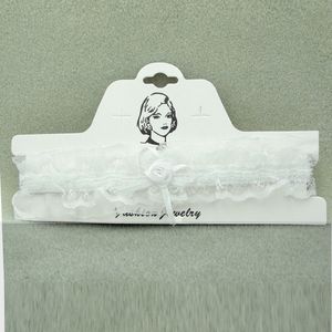 Kousenband wit organza met satijn strikje