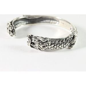 Zware zilveren klemarmband met draken