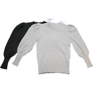 trui met bolletjes en pofmouw